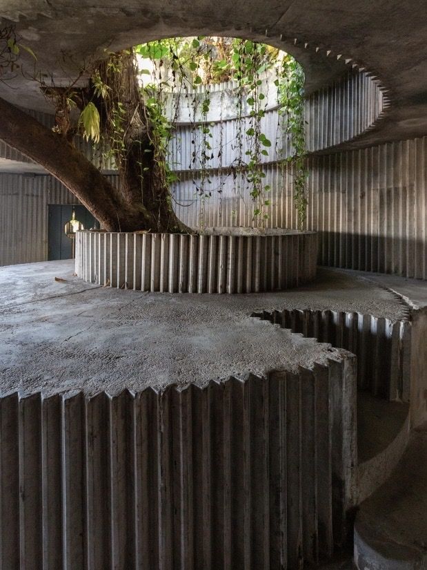 A second eco-brutalist architectural reference for the Casa Calixto flacon.